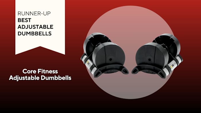 black round adjustable dumbbells core fitness on red background